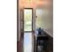 Inviting entryway with hardwood floors and a decorative table at 6585 W 84Th Way # 109, Arvada, CO 80003