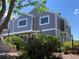 Charming townhome with well-maintained landscaping, gray siding and white trim at 6585 W 84Th Way # 109, Arvada, CO 80003