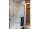 Walk-in shower features sliding textured glass doors and steel hardware at 6585 W 84Th Way # 109, Arvada, CO 80003