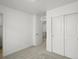 Bright bedroom with neutral carpet and large closet at 2046 S Holly St # 1, Denver, CO 80222