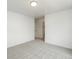 Bright bedroom with neutral carpet and white walls at 2046 S Holly St # 1, Denver, CO 80222