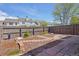 Fenced backyard with mulch landscaping and paver paths at 10711 Longs Way, Parker, CO 80138
