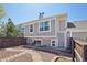 Charming home boasts a private backyard with brick-lined pathways and well-maintained landscaping at 10711 Longs Way, Parker, CO 80138