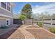Fenced backyard with mulch landscaping, paver paths and access gate at 10711 Longs Way, Parker, CO 80138