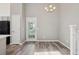 Well-lit living room area featuring an exterior door at 10711 Longs Way, Parker, CO 80138