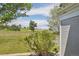 Back yard with treeline, grassy area and blue sky at 10711 Longs Way, Parker, CO 80138