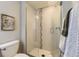 Bathroom featuring a glass shower with white subway tile surround at 2374 S University Blvd # 402, Denver, CO 80210