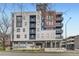 Contemporary condo building featuring modern architectural design and private balconies at 2374 S University Blvd # 402, Denver, CO 80210