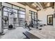 Well-equipped gym with modern weight machines and large windows providing natural light at 2374 S University Blvd # 402, Denver, CO 80210