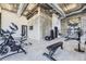 Gym featuring workout equipment, weights, and exposed ductwork at 2374 S University Blvd # 402, Denver, CO 80210