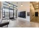 Bright lobby with a seating area, mailbox, and glass entryway at 2374 S University Blvd # 402, Denver, CO 80210