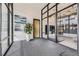 Modern building lobby with art, plant, and large windows at 2374 S University Blvd # 402, Denver, CO 80210