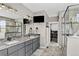 Luxurious bathroom with double vanity, modern fixtures, and a glass-enclosed shower for a spa-like experience at 31189 Manitoba Dr, Evergreen, CO 80439