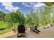 Relaxing patio with comfortable seating, perfect for enjoying the serene and natural surroundings at 31189 Manitoba Dr, Evergreen, CO 80439