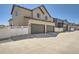 Charming two-car garage townhome with white fence in a desirable neighborhood at 1224 S Algonquian St, Aurora, CO 80018
