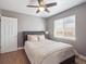 Comfortable bedroom with ceiling fan, hardwood floors and natural light at 20 S Harrison St, Denver, CO 80209
