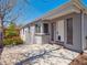 Charming home exterior with a covered porch, rock landscaping and modern design at 20 S Harrison St, Denver, CO 80209