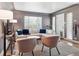 Cozy living room featuring hardwood floors, a large window and comfortable seating at 20 S Harrison St, Denver, CO 80209