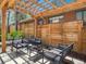 Backyard patio area with pergola and outdoor furniture set at 20 S Harrison St, Denver, CO 80209
