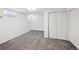 Finished basement area with gray carpet and white walls, offering a versatile space at 3316 N Columbine St, Denver, CO 80205