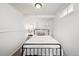 Finished basement bedroom with clean white walls, neutral carpet, and a minimal aesthetic at 3316 N Columbine St, Denver, CO 80205