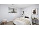 Comfortable bedroom featuring neutral walls, carpet, and art at 16259 W 10Th Ave # I2, Golden, CO 80401