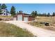 Spacious metal barn features multiple bay doors, offering ample storage and utility on the property at 8361 Piney Creek Rd, Parker, CO 80138