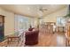 Elegant main bedroom with a fireplace, french doors, and ample natural light at 8361 Piney Creek Rd, Parker, CO 80138