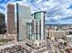 Aerial shot of building with parking lot and city view at 2001 Lincoln St # 2420, Denver, CO 80202