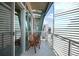 Inviting balcony with patio furniture, offering stunning city views at 2001 Lincoln St # 2420, Denver, CO 80202