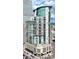 Modern high-rise condo building at 2001 Lincoln St. #2420, Denver, CO 80202, with pool and city views at 2001 Lincoln St # 2420, Denver, CO 80202