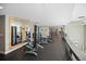 Spacious gym with modern fitness equipment and floor to ceiling mirrors at 2001 Lincoln St # 2420, Denver, CO 80202