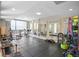 Bright gym area with various fitness equipment and large mirrors at 2001 Lincoln St # 2420, Denver, CO 80202