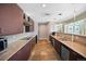 Modern kitchen with stainless steel appliances, granite countertops, and ample cabinet space at 2001 Lincoln St # 2420, Denver, CO 80202