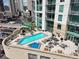 Stunning rooftop pool and lounge area with views of the city at 2001 Lincoln St # 2420, Denver, CO 80202