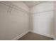 Walk-in closet features ample storage space with wire shelving at 2001 Lincoln St # 2420, Denver, CO 80202