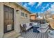 Comfortable patio seating arrangement with a modern fire pit, ideal for outdoor entertaining at 748 Elati St, Denver, CO 80204