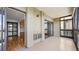 Balcony with sliding glass doors and concrete flooring, and views to the living room at 13601 E Marina Dr # 604, Aurora, CO 80014