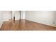Bedroom featuring hardwood floors, closet, and access to the bath at 13601 E Marina Dr # 604, Aurora, CO 80014