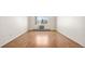 Spacious bedroom with hardwood floors, large window, and ample natural light at 13601 E Marina Dr # 604, Aurora, CO 80014