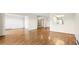 Spacious living room featuring hardwood floors and an open layout, perfect for entertaining and relaxation at 13601 E Marina Dr # 604, Aurora, CO 80014