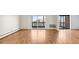 Bright room with hardwood flooring and sliding door to the outdoor balcony at 13601 E Marina Dr # 604, Aurora, CO 80014