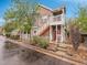 Attractive multi-level brick townhomes featuring private entrances, stairs, and well-maintained landscaping at 16366 E Fremont Ave # 3, Aurora, CO 80016