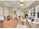 Open-concept living space featuring fireplace and hardwood flooring at 16366 E Fremont Ave # 3, Aurora, CO 80016