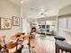 Comfortable living and dining area featuring hardwood floors and a fireplace at 16366 E Fremont Ave # 3, Aurora, CO 80016
