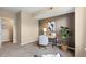 Neutral toned bedroom with a desk and comfortable chair at 7440 S Blackhawk St # 205, Englewood, CO 80112