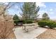 Outdoor common area with picnic table and grill for community enjoyment at 7440 S Blackhawk St # 205, Englewood, CO 80112