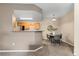Bright dining area with modern table setting, adjacent to the kitchen with a breakfast bar at 7440 S Blackhawk St # 205, Englewood, CO 80112