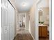 Hallway view leading to bedroom and bathroom at 7440 S Blackhawk St # 205, Englewood, CO 80112