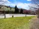 Community pool area features grassy area and lush trees with great sun and shade at 7440 S Blackhawk St # 205, Englewood, CO 80112